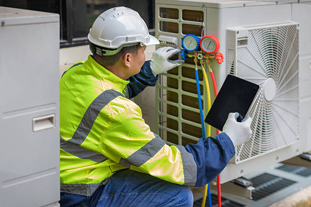 Professional Air Duct Cleaning technician working in Saint John, IN